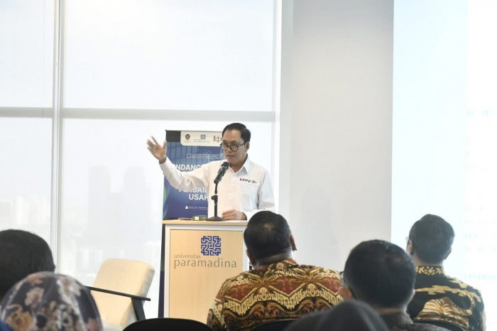 Ketua KPPU Hadiri Simposium Nasional UU BUMN: Dorong Kepatuhan dan Persaingan Sehat